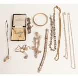 A collection of costume jewellery including silver charm bracelet, silver bracelet, antique