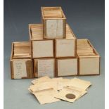 Seven wooden collector's trays containing an amateur collection of 20thC overseas coinage, all