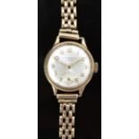 J W Benson 9ct gold ladies wristwatch with inset subsidiary seconds dial, gold hands and Arabic
