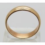 A large 9ct gold ring/ wedding band, size 1, 5.6g.