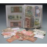 An amateur collection of English and overseas banknotes in an album, around 200 in all, mostly