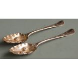 Pair of Georgian bottom hallmarked silver berry spoons, London, date letter indistinct but circa