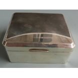 Hallmarked silver cigarette box with chamfered corners, Birmingham 1957 maker Adie Brothers Ltd,