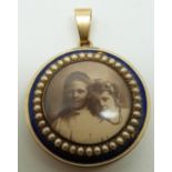 Victorian locket set with royal blue guilloché enamel and seed pearls, verso a glass compartment set