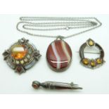 Three white metal Victorian brooches set with agate, and an agate pendant