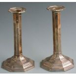 Pair of Edward VII hallmarked silver octagonal candlesticks, Sheffield 1909 maker Hawksworth, Eyre &