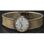 COLLECTING Marvin 9ct gold ladies wristwatch with gold hands, two-tone hour markers, silver dial and