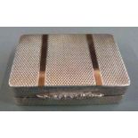 Hallmarked silver engine turned snuff box with gold stripe decoration, hinged lid and thumb piece,