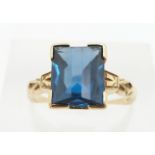 A 14k ring set with a mixed cut blue paste stone, 2.4g, size K