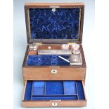 19th century mahogany cased travelling set, the fitted velvet interior with silver plate mounted