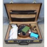 Brown briefcase including tea cards, watches, jewellery, coins etc