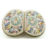 A 19thC Italian micro mosaic buckle, with floral decoration, maker's mark FAP, width 70cm