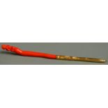 Coral and yellow metal pen the metal body with chased decoration and the coral handle carved in