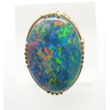 A 14ct gold ring set with an opal triplet, 8.7g, size N