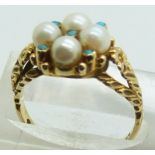 A 9ct gold ring set with pearls and turquoise, 3.8g, size N