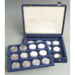 'World at War' commemorative coin set comprising mostly silver 'crown' sized coins