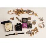 A collection of costume jewellery including Victorian back and front locket, silver rings, silver