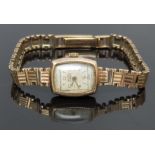 Invicta 9ct gold ladies wristwatch with gold hands and hour markers, textured silver dial, and later