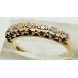 A 9ct gold half eternity ring set with diamonds, 3.2g, size P