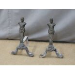Pair of cast iron figural fire dogs