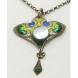 A hallmarked silver Art Nouveau pendant with green, blue and yellow enamel and a central pearl (