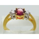 COLLECTING  An 18ct gold ring set with a round cut natural ruby of approximately 0.7ct, origin Sri