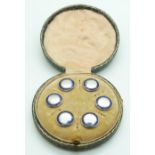 A set of six hallmarked Edwardian silver buttons set with blue enamel in original box, Birmingham