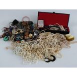 A collection of costume jewellery including faux pearls, necklaces, bracelets etc
