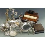 Silver plated ware to include salver, serving dishes, candelabra, pair of candlesticks, cased and