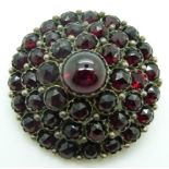 Victorian brooch set with Bohemian cut garnets