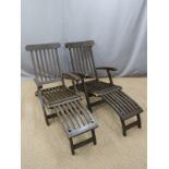 Two reclining steamer or similar garden chairs