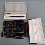 A collection of various fountain pens etc.
