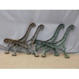 Four matching cast iron garden bench supports of naturalistic twig or branch design