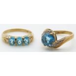 Two 9ct gold rings set with blue topaz and diamonds, 4.5g