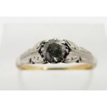 Art Deco 18ct gold ring set with a diamond of approximately 0.3ct in a platinum setting, in