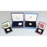 2003 Royal Mint silver proof cased coins comprising a Coronation Anniversary crown, a Suffragette