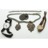 A 9ct gold watch, silver watch, two silver fobs, silver plated Albert and a silver bracelet