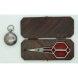 A pair of Art Deco scissors in bespoke rosewood box and silver plated sovereign case.
