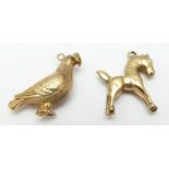 A 9ct gold charm/ pendant in the form of a dove, 2 x 2cm and a 9ct gold pendant/charm in the form of