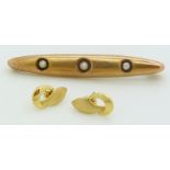 A 10k gold brooch set with pearls (1.9g) and a pair of 18ct gold earrings (0.6g)