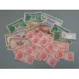 Twenty two Hong Kong banknotes 1940s onwards, various denominations from ten dollars down to ten