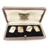A pair of 9ct gold cufflinks with engine turned decoration in Bravingtons box, 5.4g