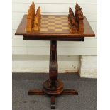 Wooden chess table and chess set, the pieces carved as oceanic creatures and mermaids, the table