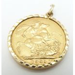 A 1901 gold full sovereign in 9ct gold mount, 8.85g