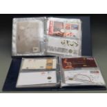 Royal Mail/ Royal Mint philatelic numismatic covers in two albums, covering a diverse range of