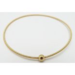 An 18ct gold bangle, 2.7g