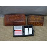 Two carved wooden boxes, one with brass inlay and a bridge/playing card set