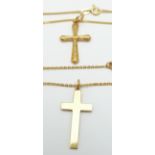 A 9ct gold cross and chain (3.3g) and an 18ct gold cross and chain (5.2g)