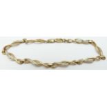 A 9ct gold bracelet set with diamonds, 5.4g