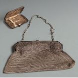 White metal mesh purse marked Argentor, width 18cm together with a white metal filigree purse,